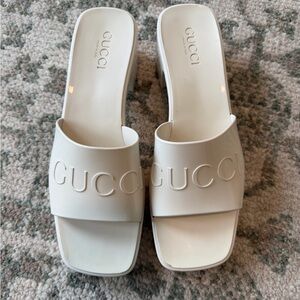 Gucci Cream Embossed Logo Slide Mules
